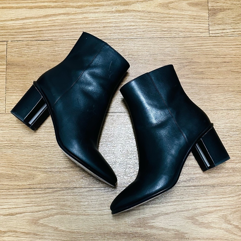 Tory Burch 
HEELED BLACK ANKLE LEATHER BOOT